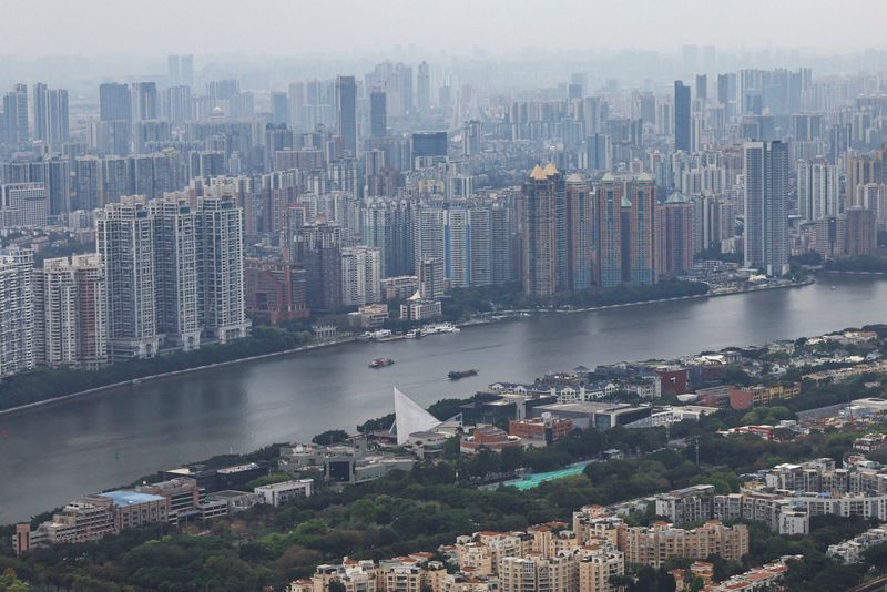 China property shares jump as major cities ease buying curbs