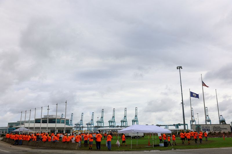 Lines of ships at US ports grow as dockworker strike enters third day