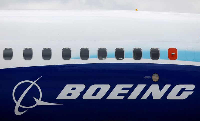 Boeing warns of bigger-than-expected $4 billion quarterly loss; shares drop